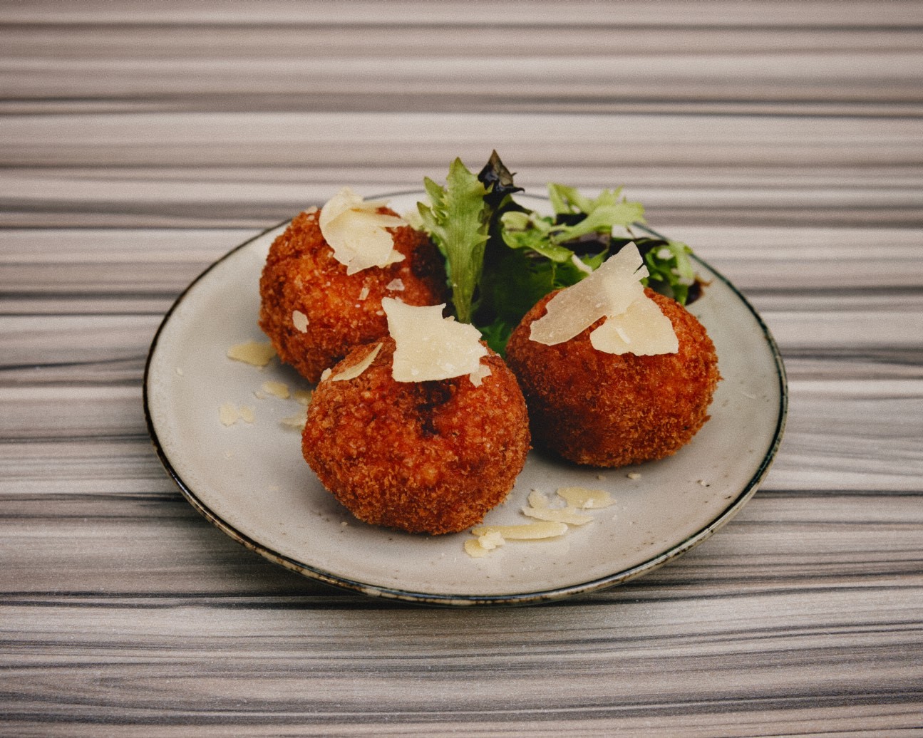 Arancini with shaved parmesan