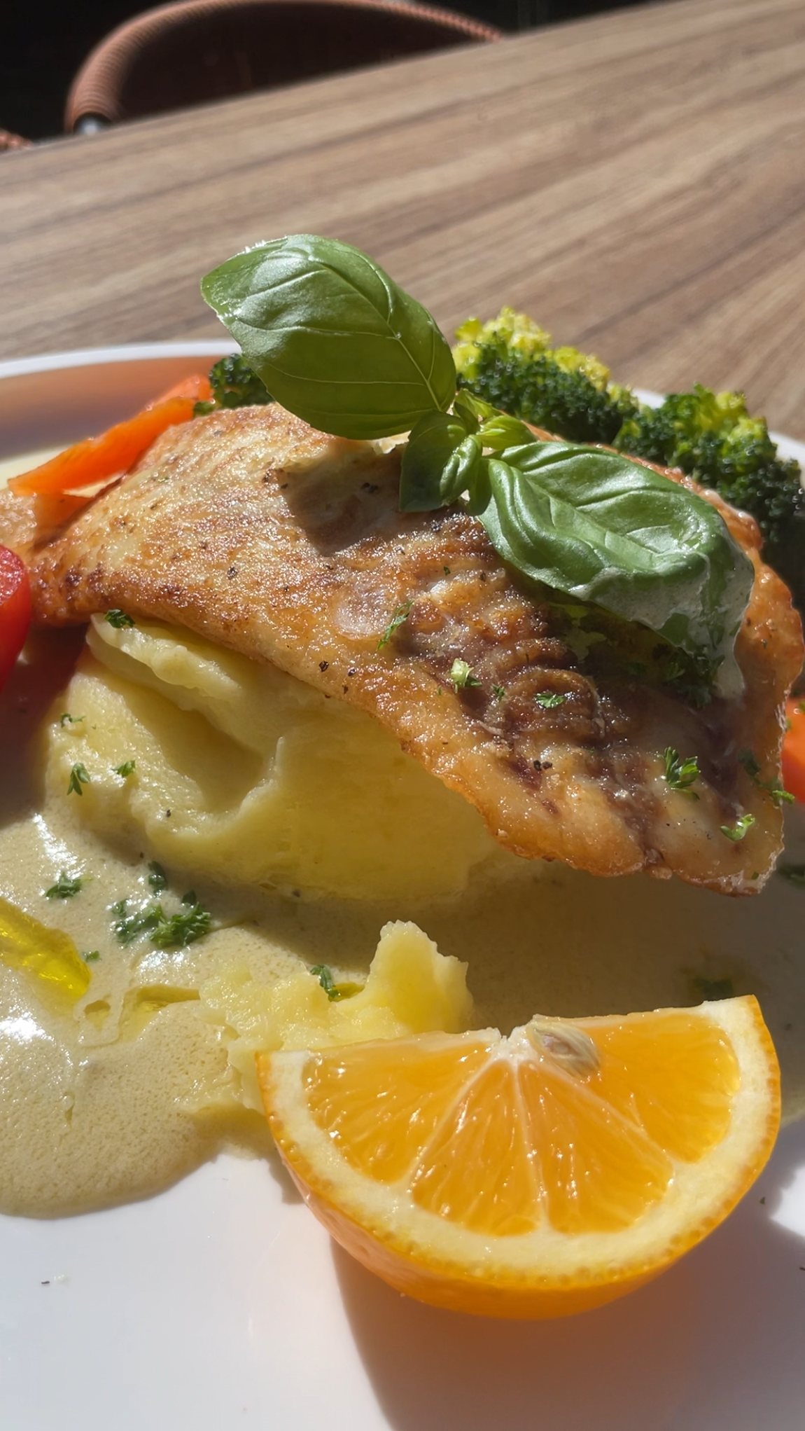 Pan-seared snapper with mashed potato, sautéed vegetables and Gina's special sauce